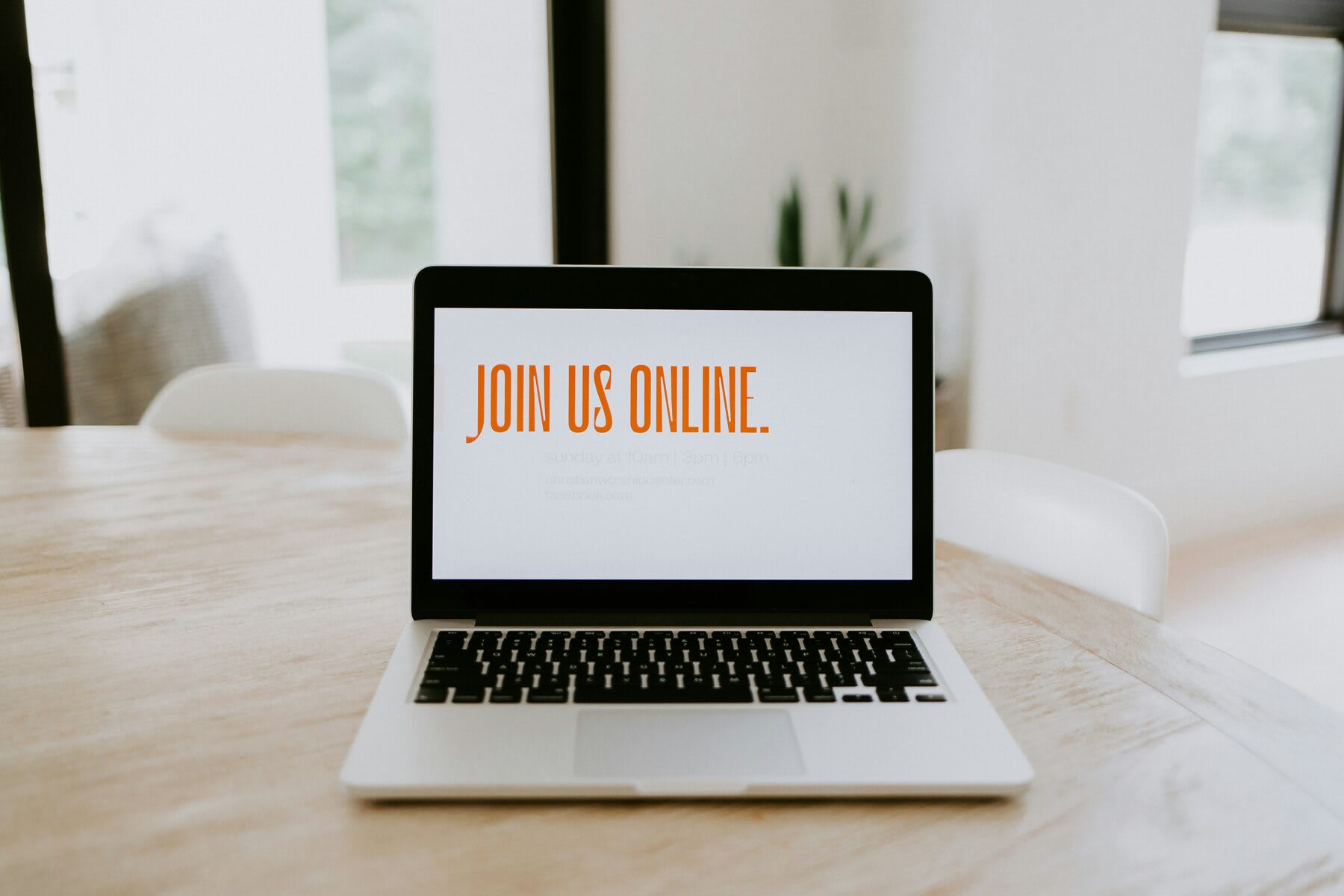 Laptop with a text banner stating join us online