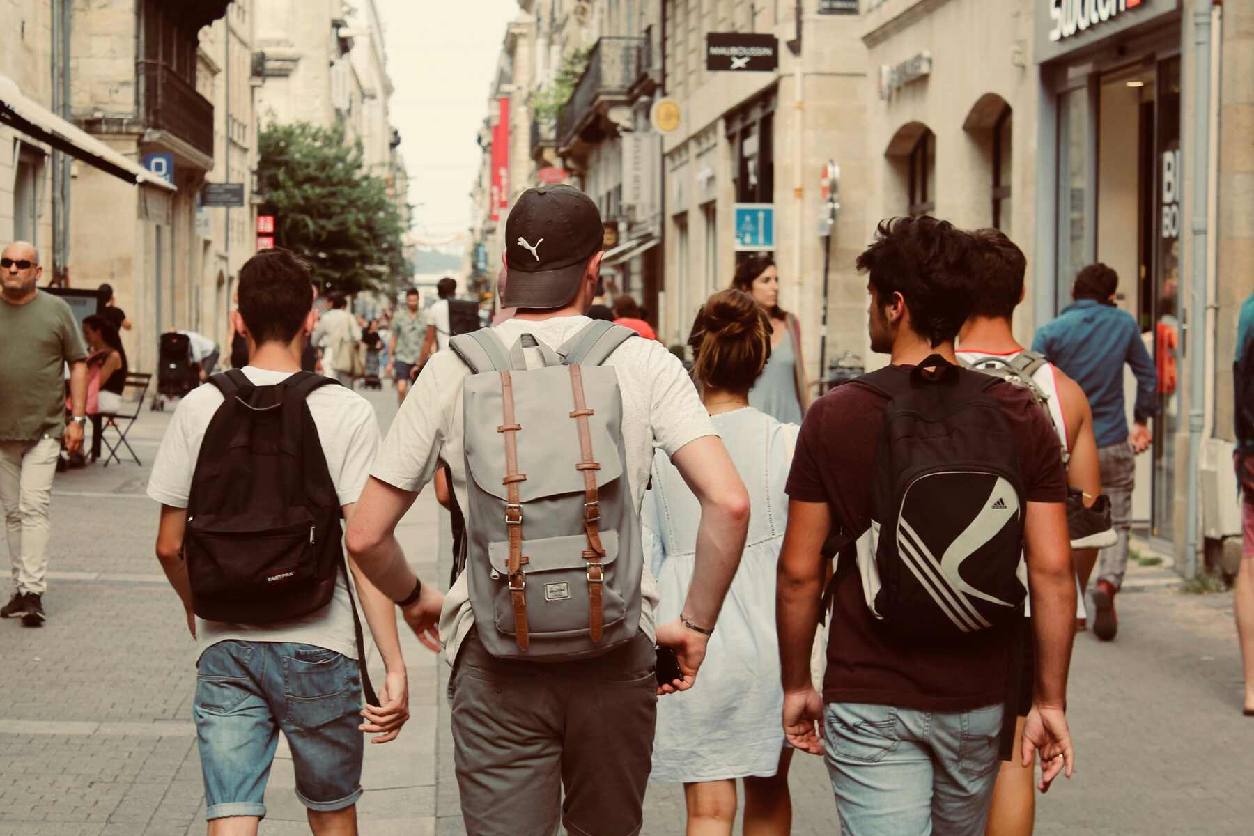 Group of students walking with their backpacks