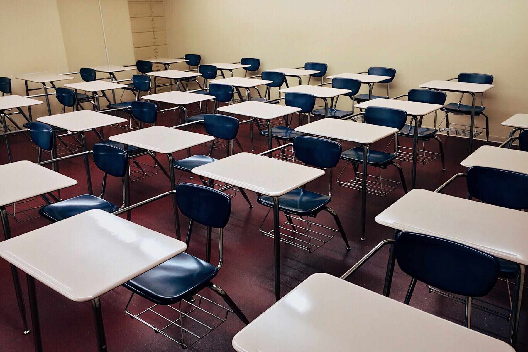 Chairs and tables of an empty classroom