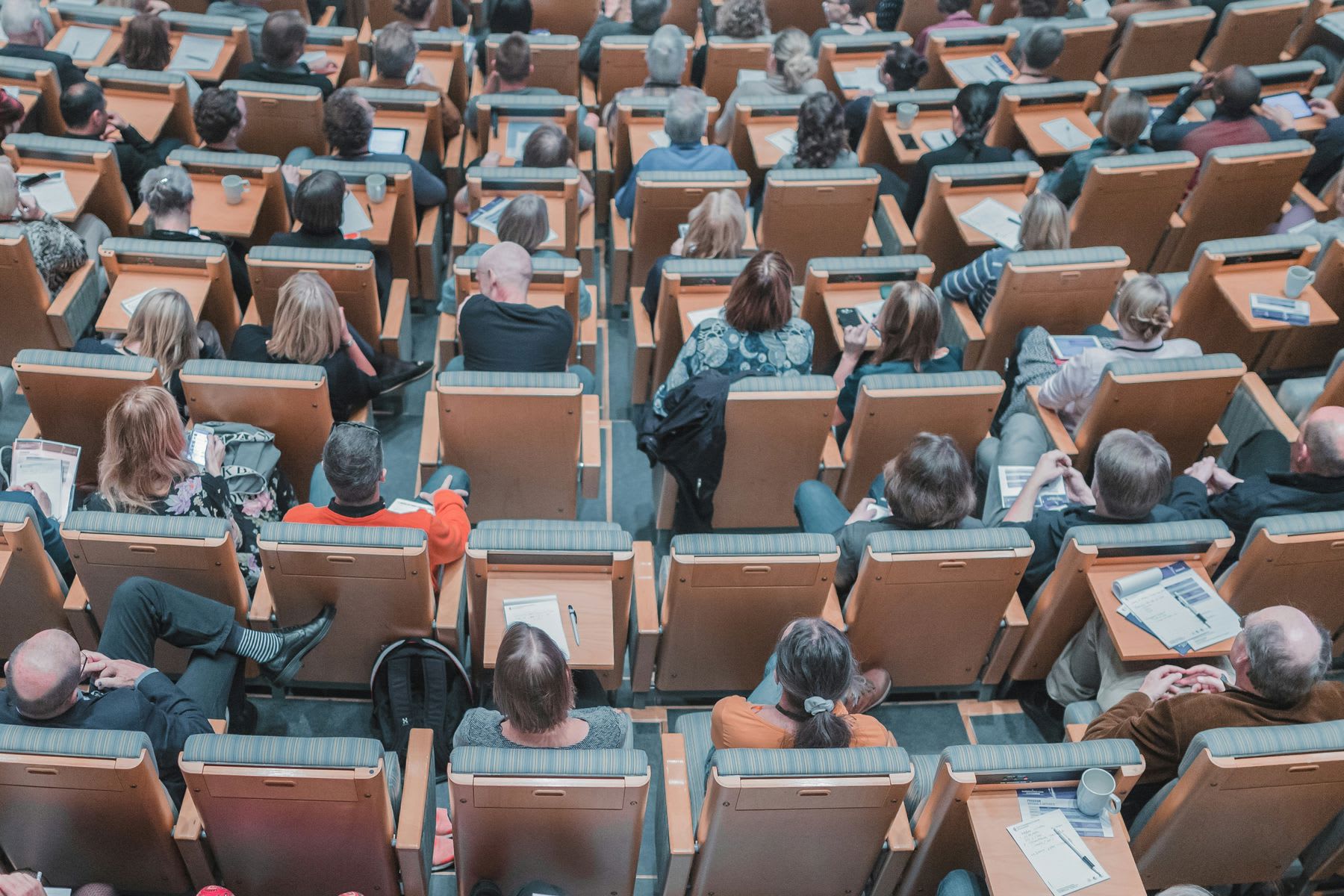Graduate students listening to a lecture in a classroom