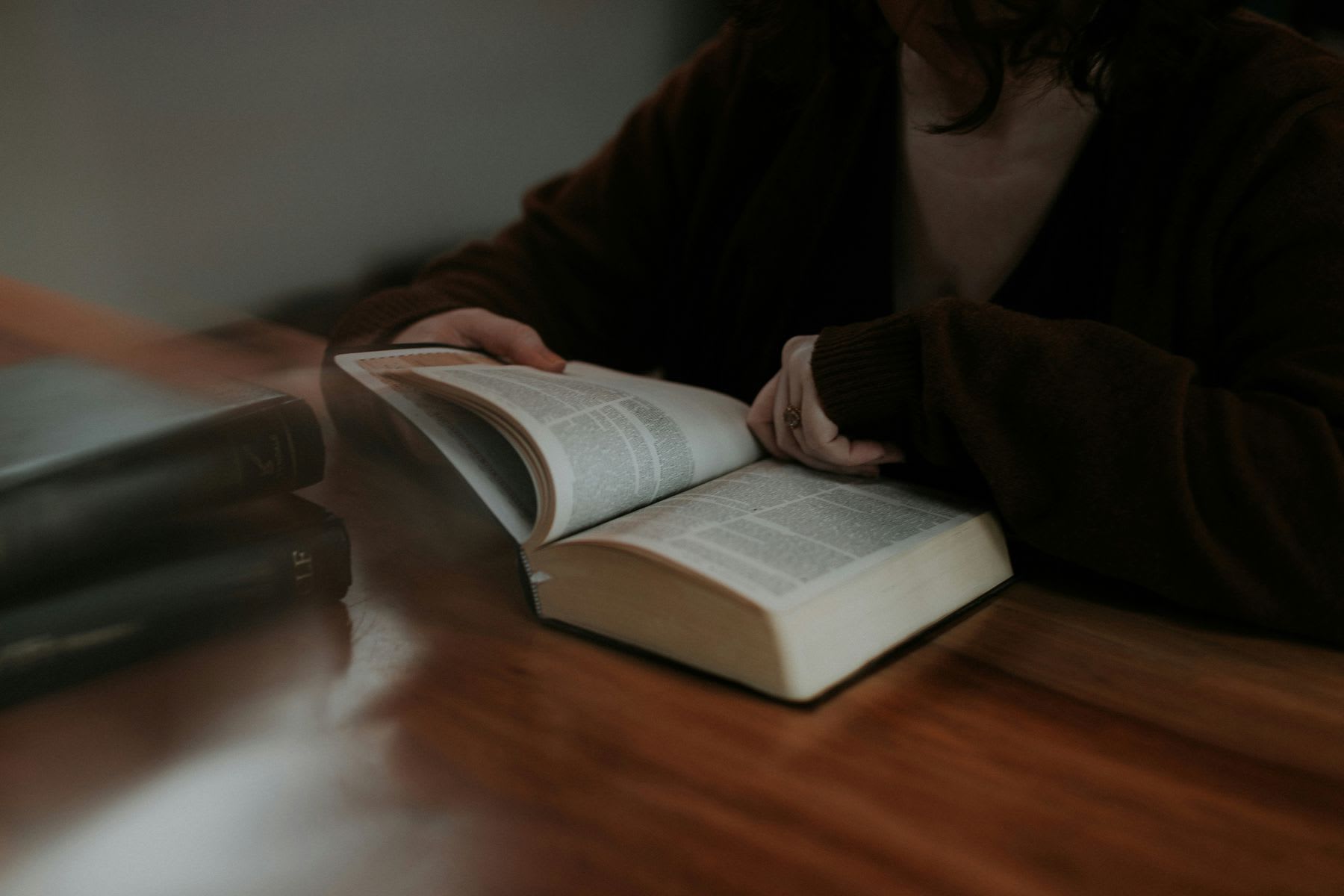 Woman reading a bible