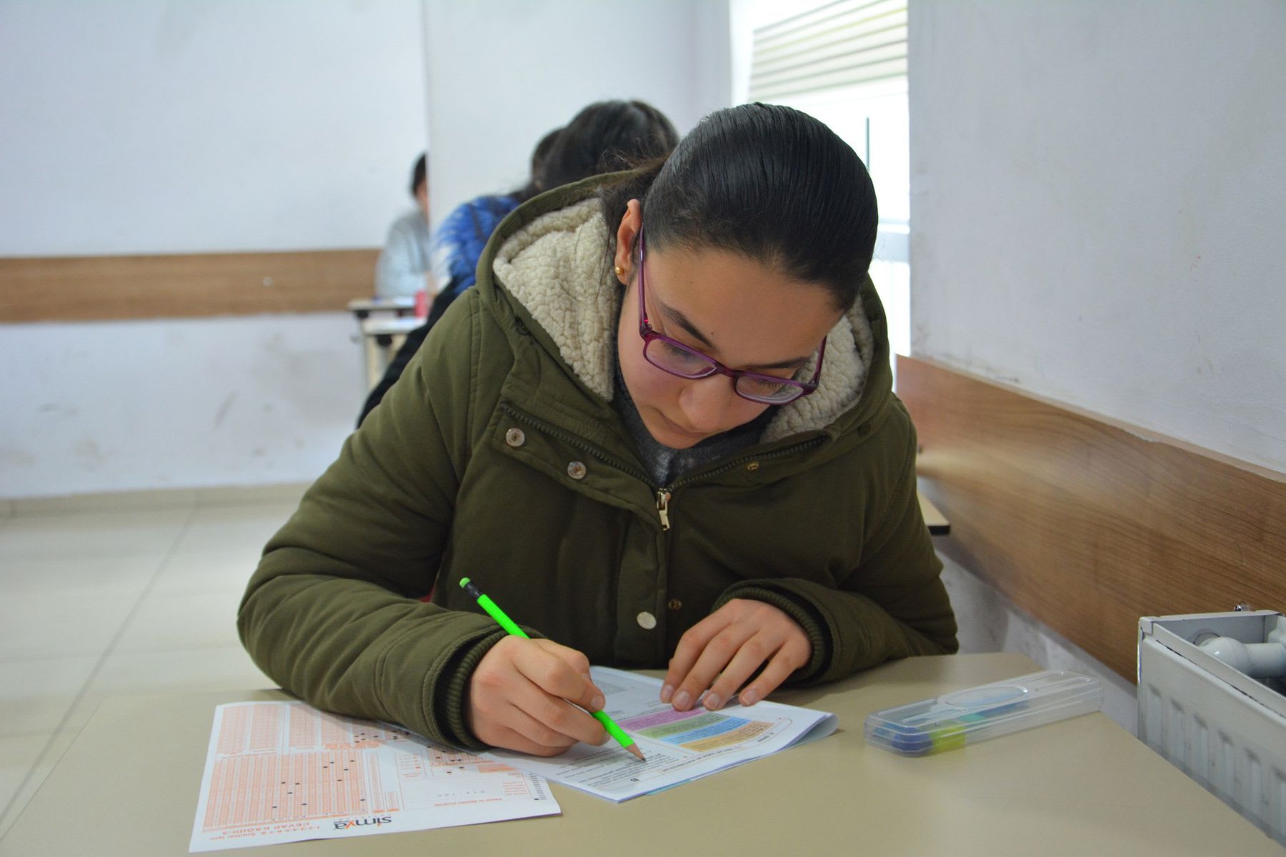 Woman in the middle of a school exam