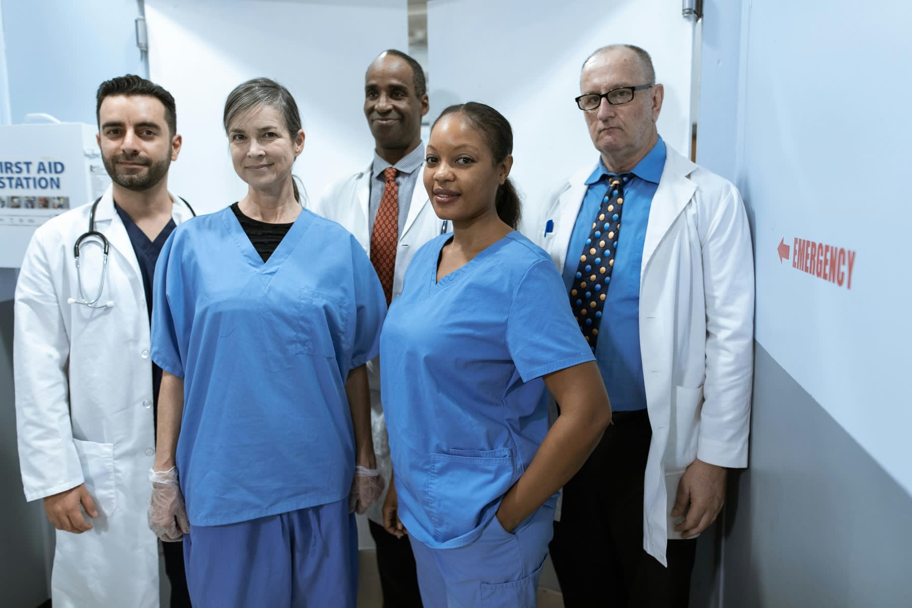 Doctors and nurses posing for a photo together