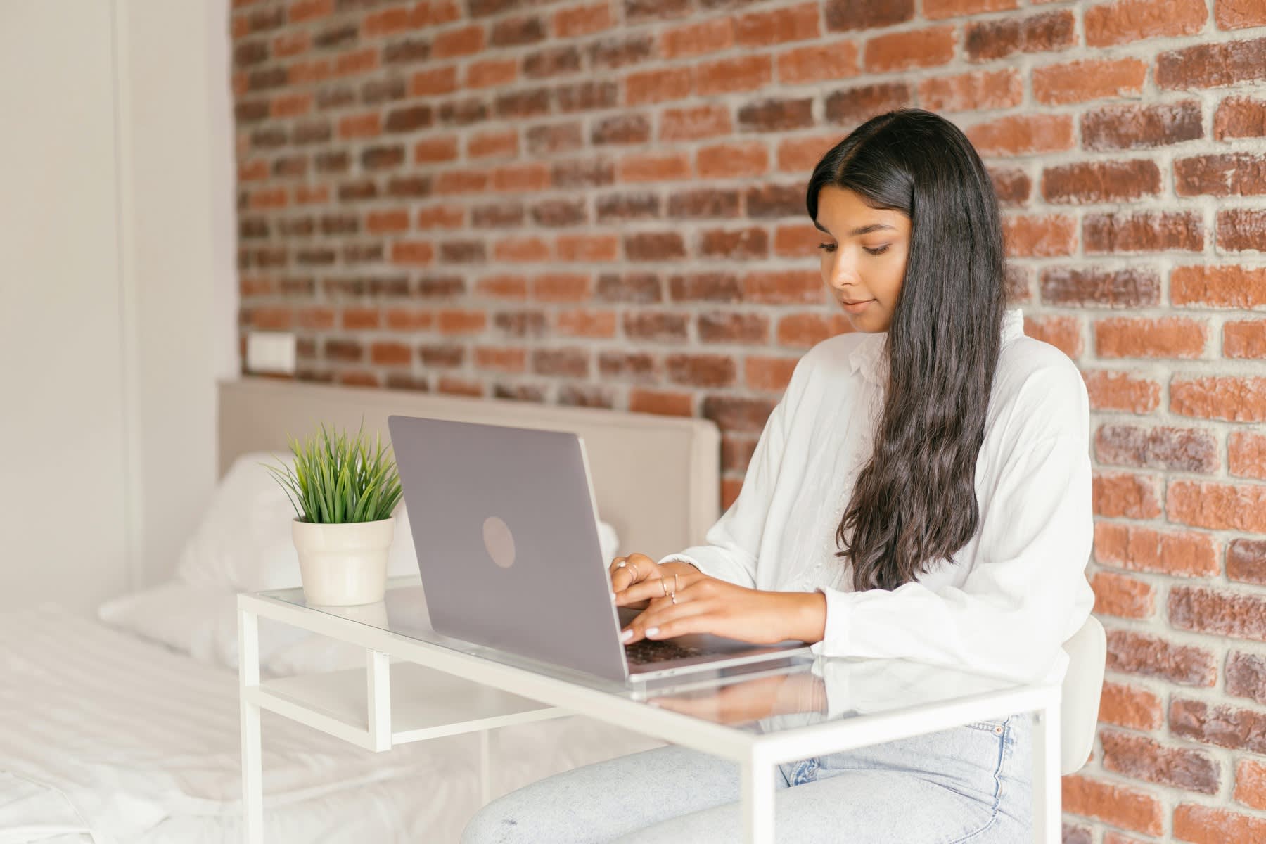 Young woman using her laptop