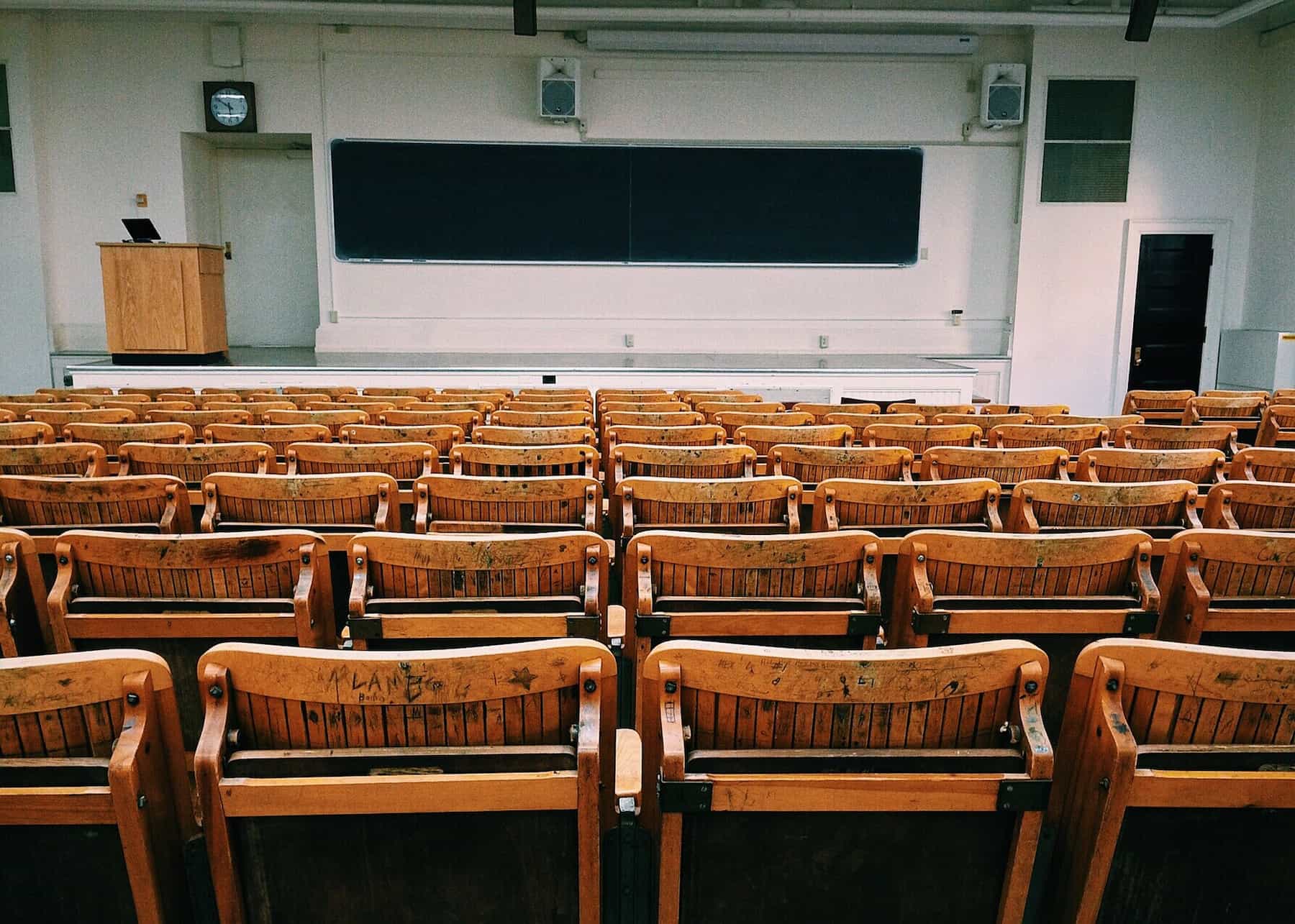 Rows of chairs on an empty classroom
