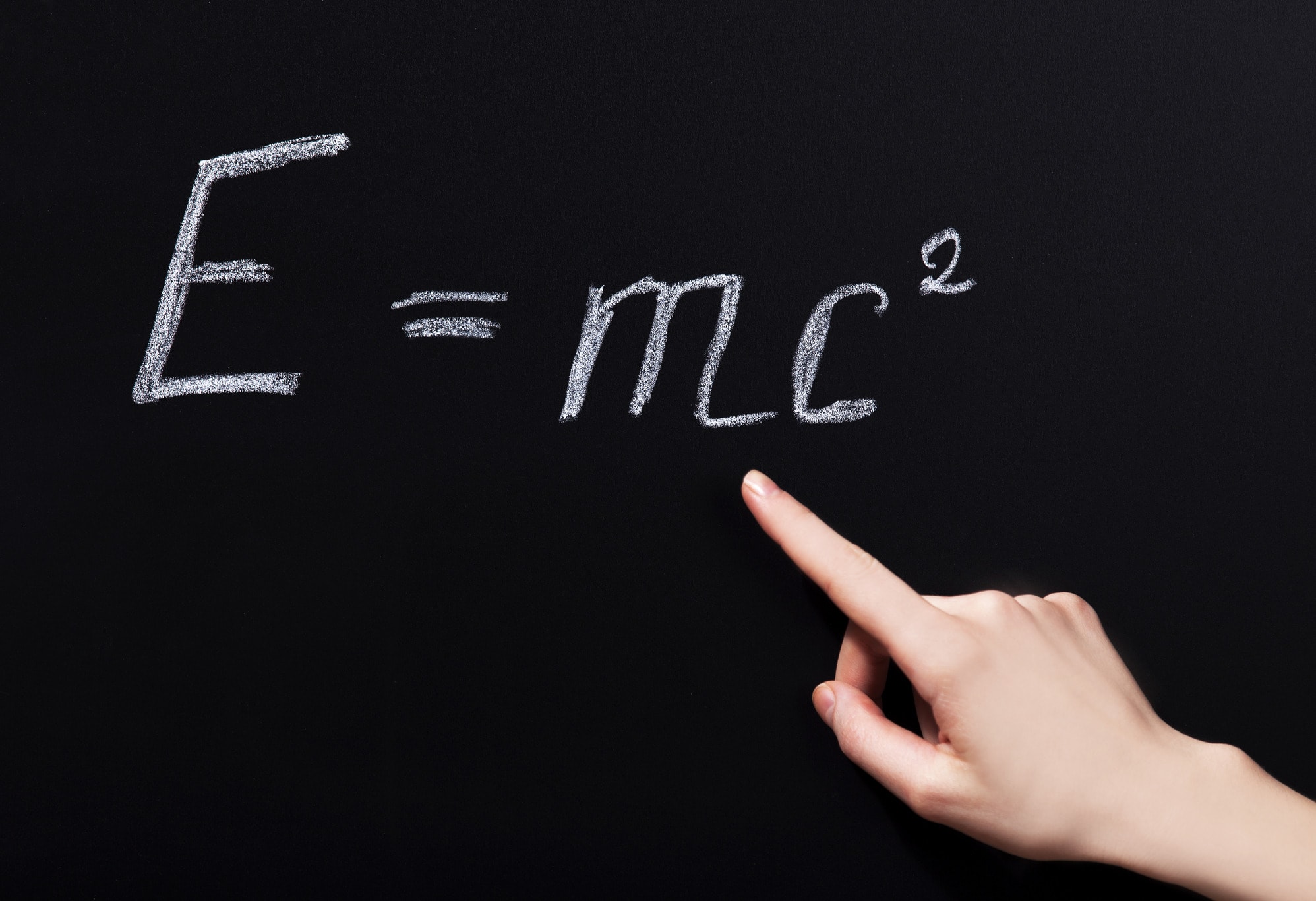 E=mc2 on a chalkboard