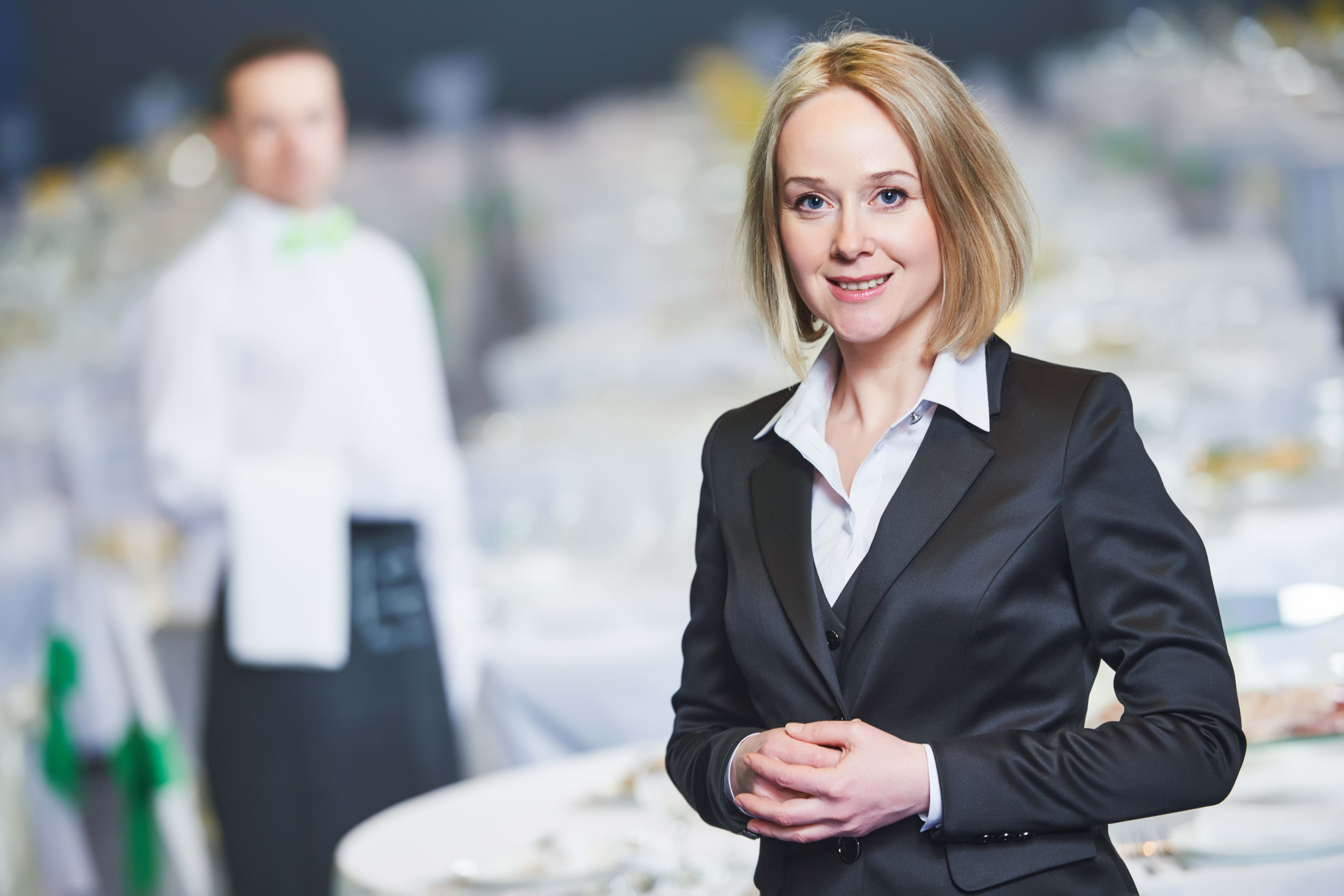 catering manager standing at a catering event