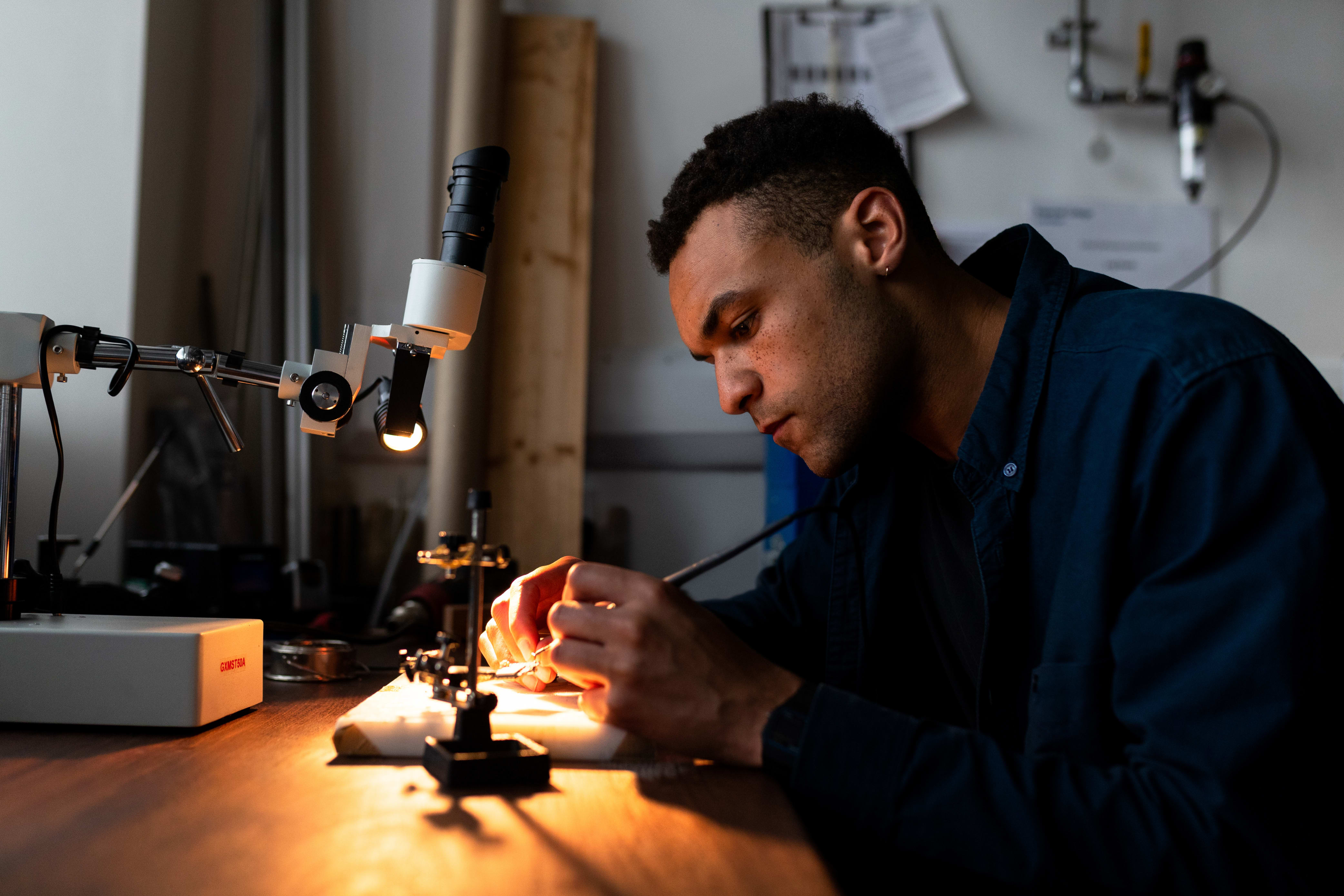 mechanical engineer working with a soldering iron