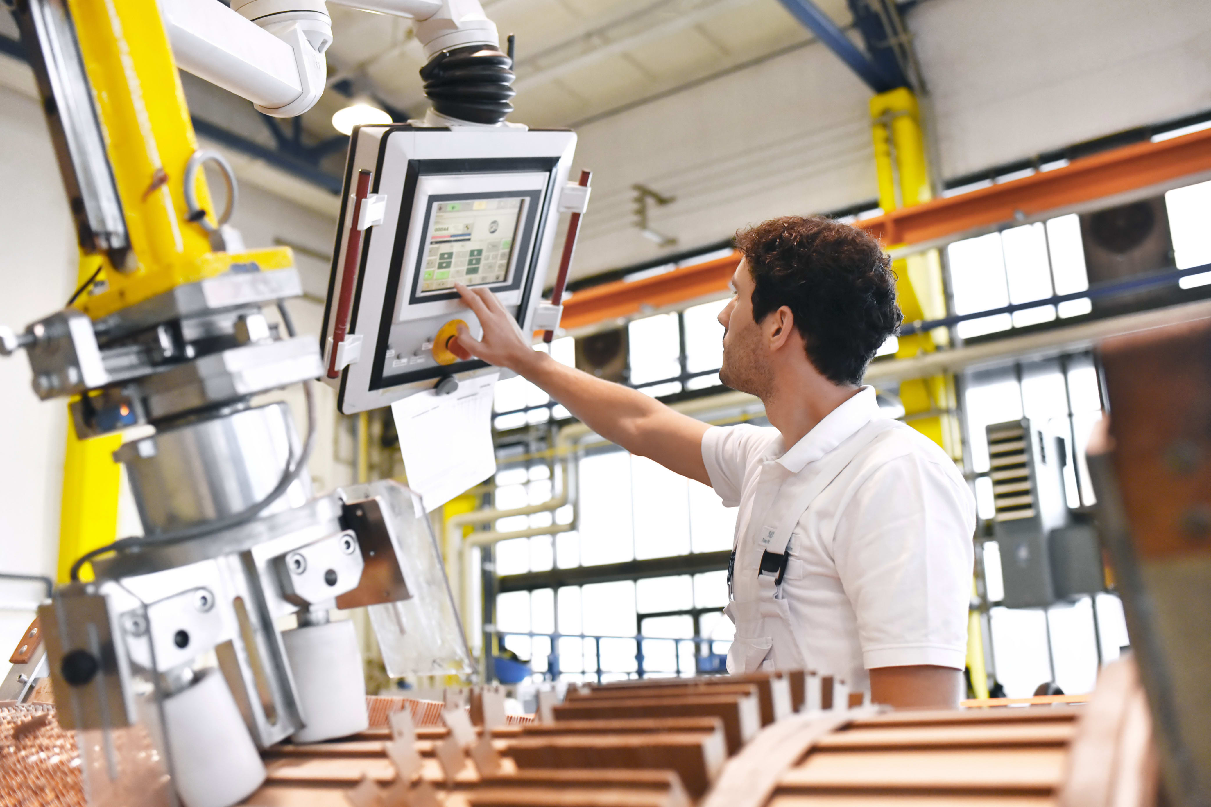 mechanical engineer making adjustments to machinery