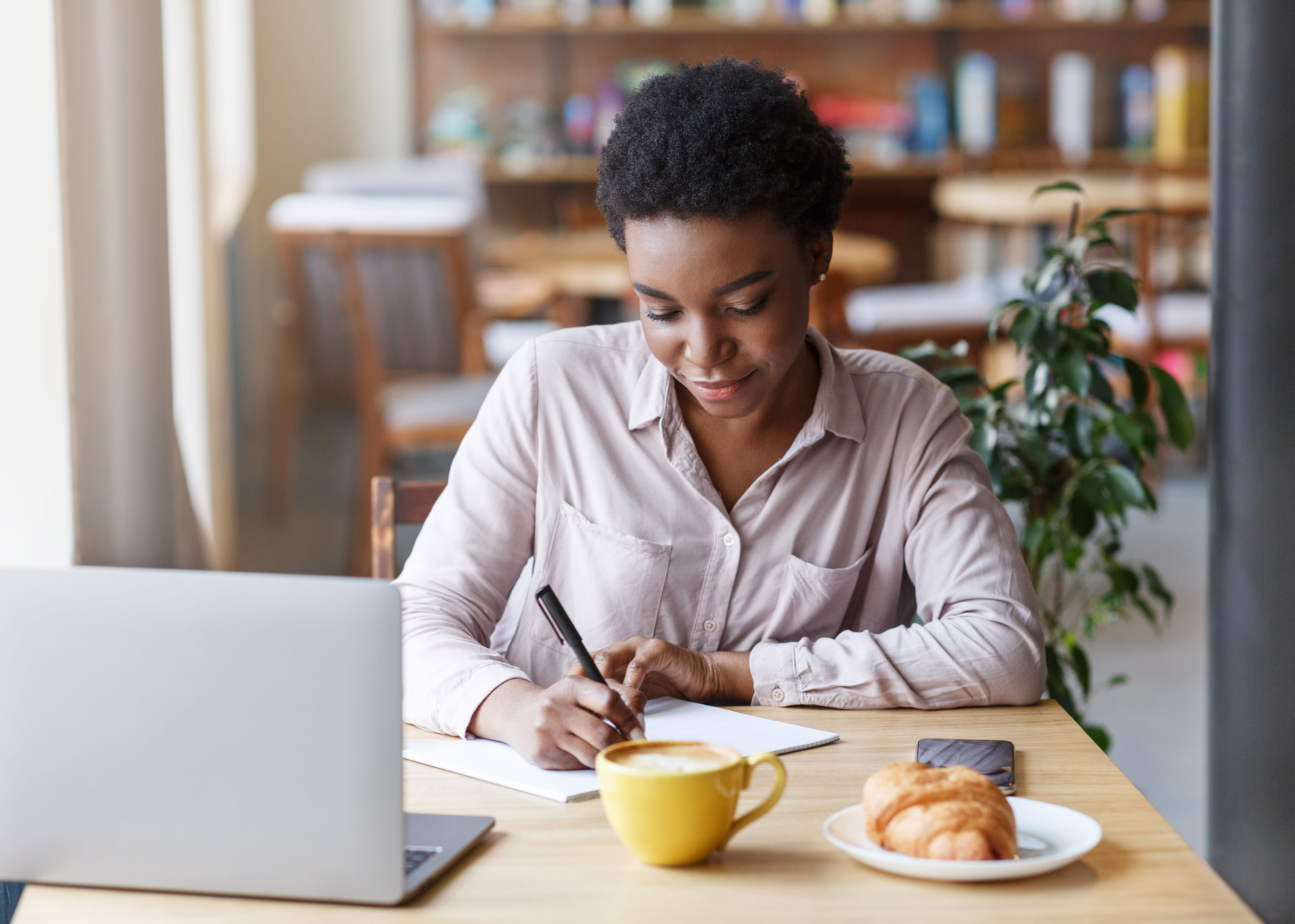 Female student taking notes