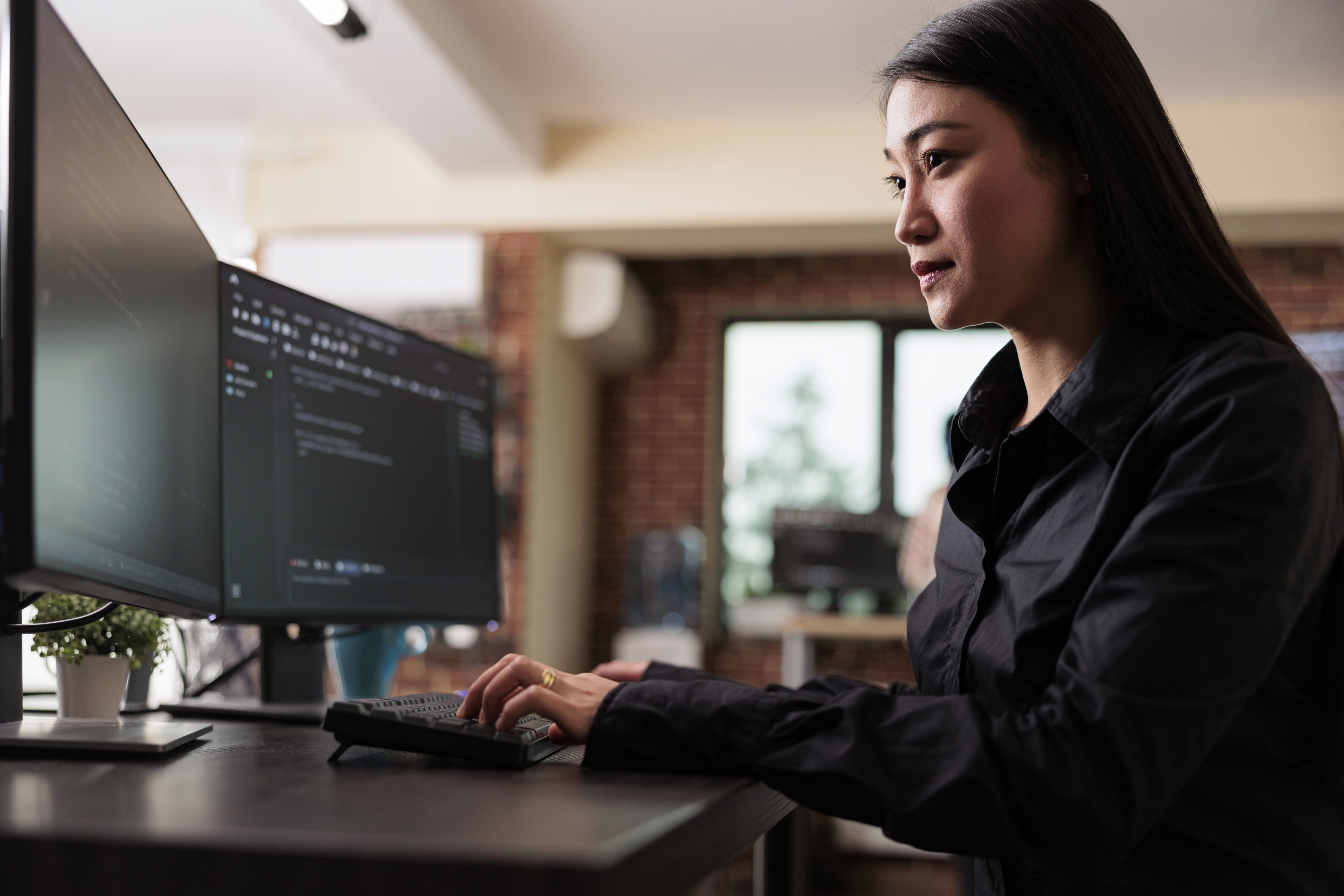 Woman in black coding