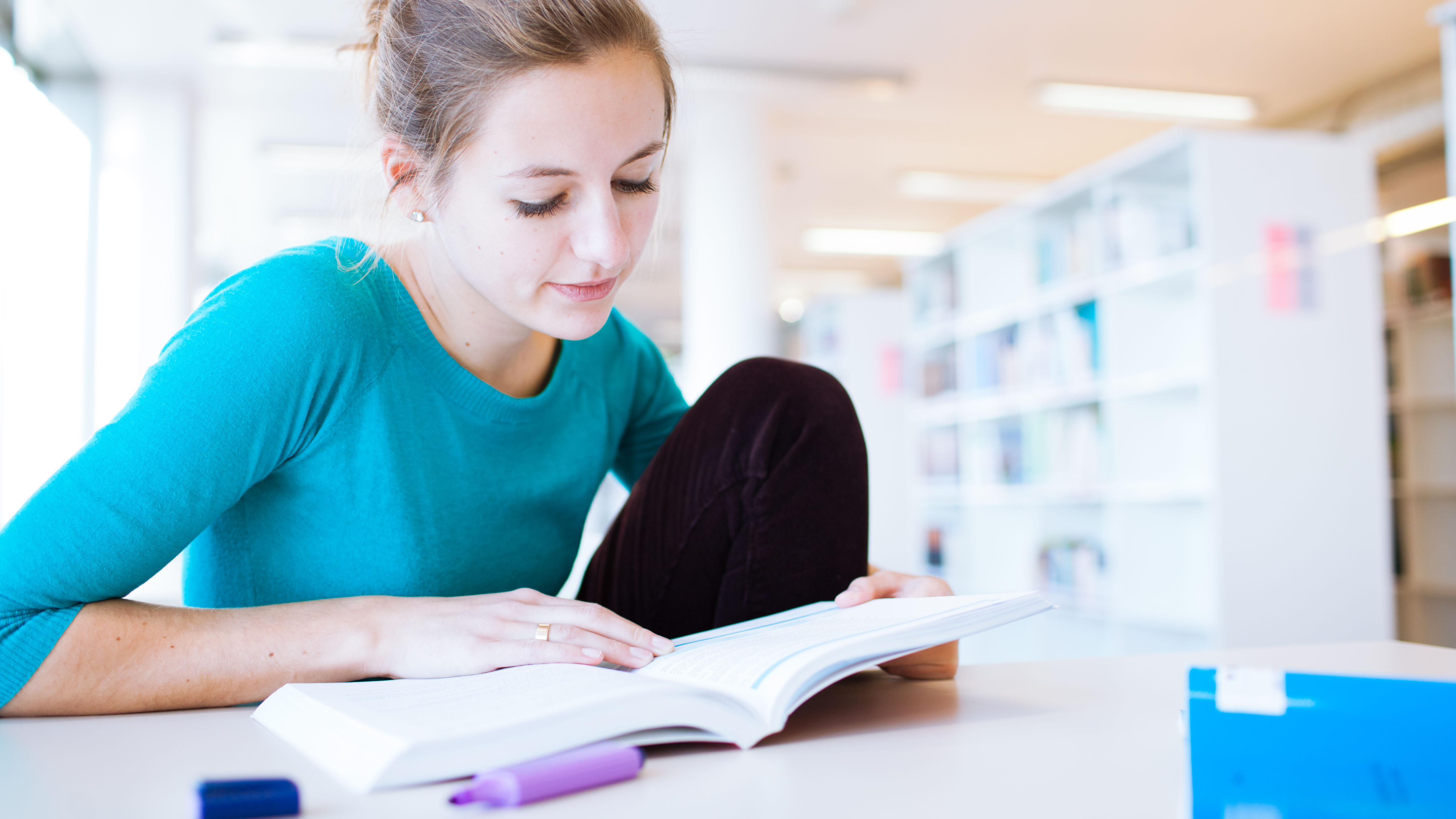 Student working in a library