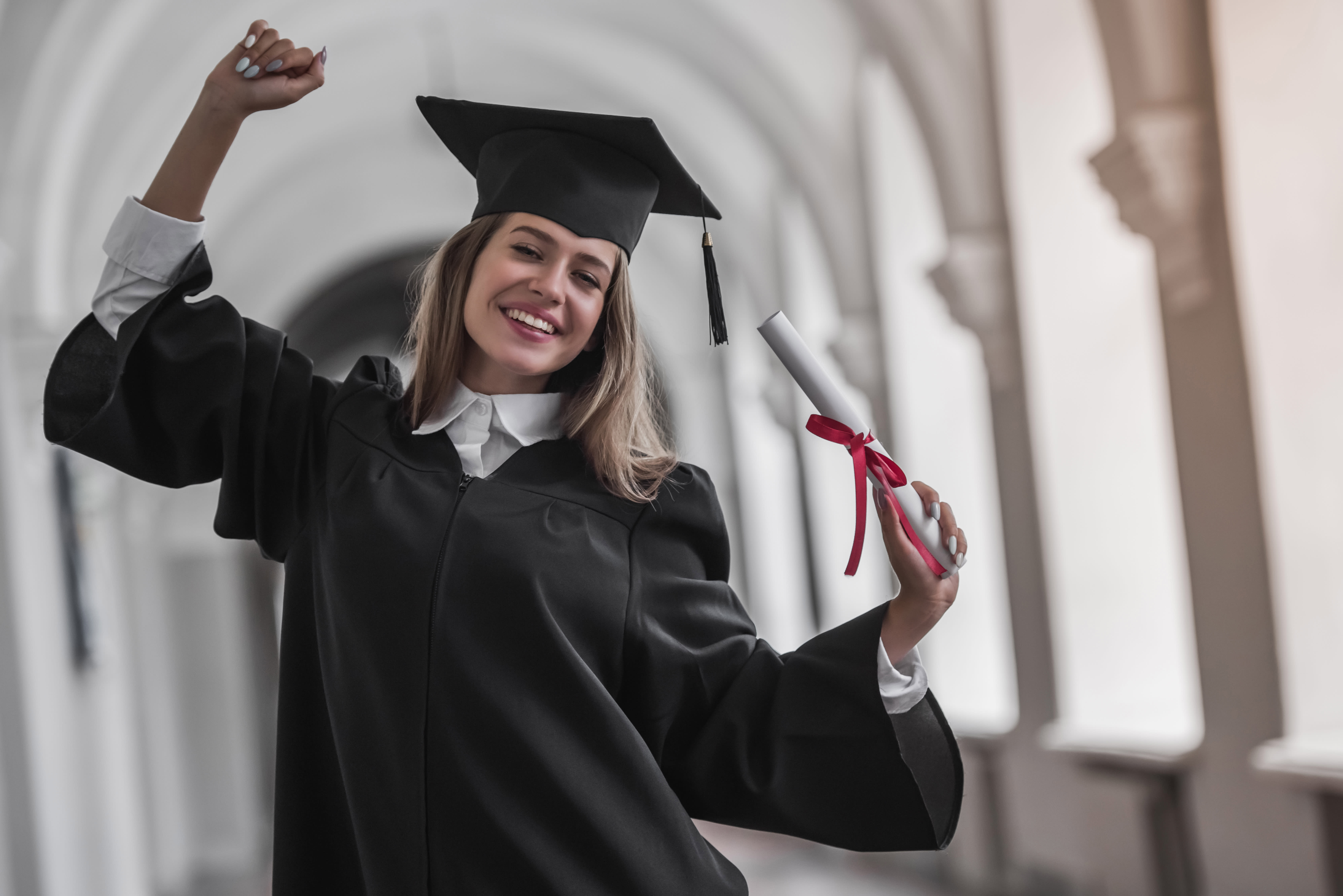 Female graduate celebrating