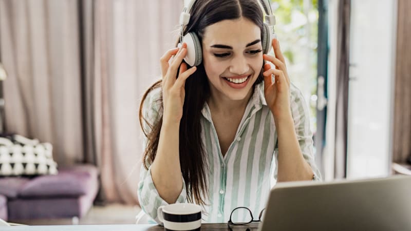 Woman smiling with headphones