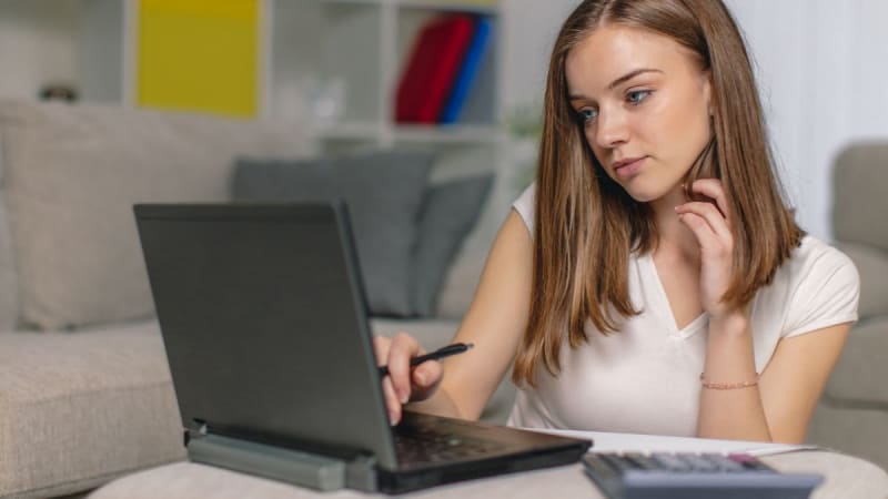 Female student working on a laptop