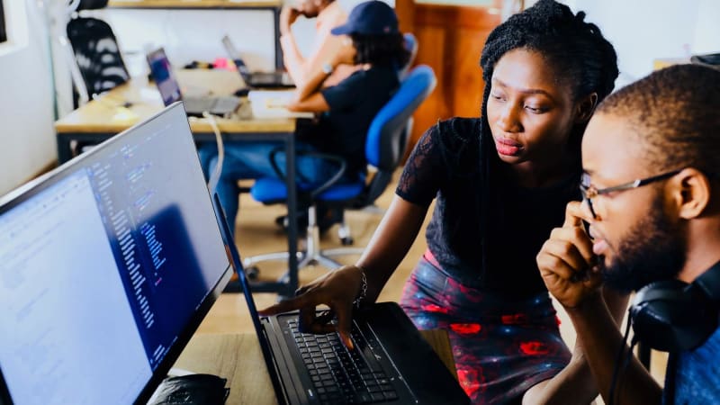 Students working at a computer
