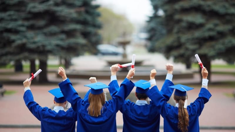 Graduates with gown and cap