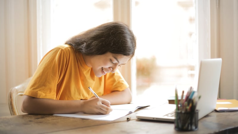 Woman studying at a table
