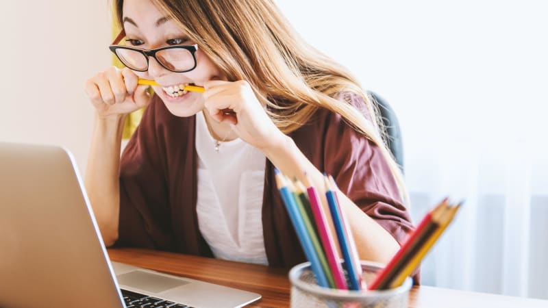 Woman focused on laptop