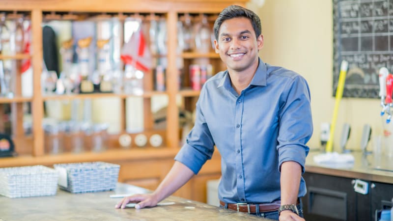 Man smiling in an office