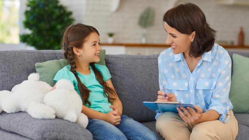 Woman talking to a child
