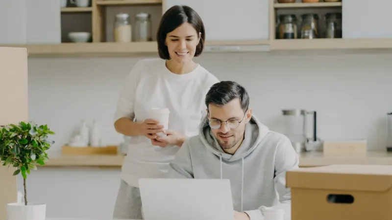 Parents looking at a computer together